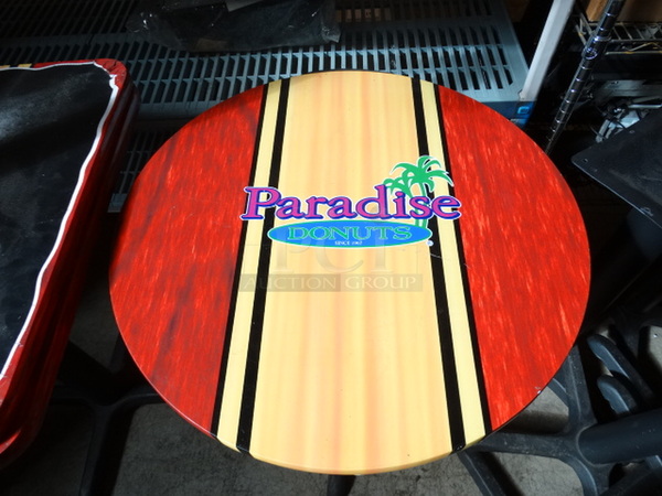 Round Table on Black Metal Table Leg w/ Paradise Logo. Stock Picture - Cosmetic Condition May Vary. 24x24x29 - Image 4 of 4