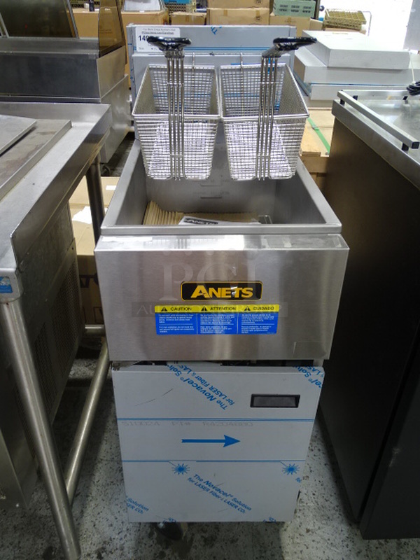 STILL IN THE BOX! Brand New Antes Model SLG50 SilverLine Commercial Stainless Steel Floor Model Gas Fryer With Commercial Casters. Stock Photo Cosmetic Differences May Occur 120,000 BTU 18x36x46
