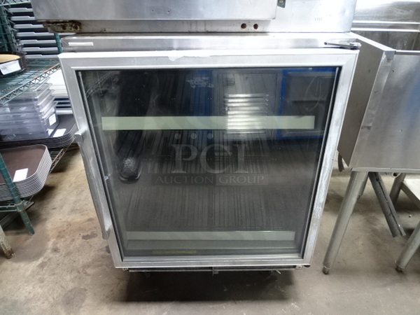 NICE! Silver King Model SKF27B Commercial Stainless Steel Undercounter Freezer With Glass Door And Commercial Casters. 27x29x37 Tested And Works.