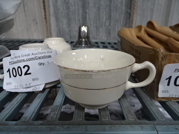 (x3) 3 Times Your Bid. Tea Cups With Gold Trim. 5x4x2.5