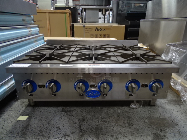 WOAH! Brand New Globe Model GHP36G Commercial Stainless Steel Countertop Natural Gas Hotplate With Cast Iron Burners. LP Conversion Kit Included. 2 Year Parts And Labor Warranty, Standard. 36x28x15 132,000 BTU/HR