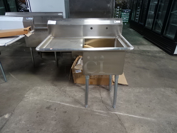 AMAZING! Brand New John Boos Model E1S8-18-12L18 Commercial Stainless Steel 1 Compartment Sink With 9 3/4” H Boxed Backsplash, Galvanized Legs Still In The Box And Adjustable Plastic Bullet Feet. 38.5X23.5x43.75