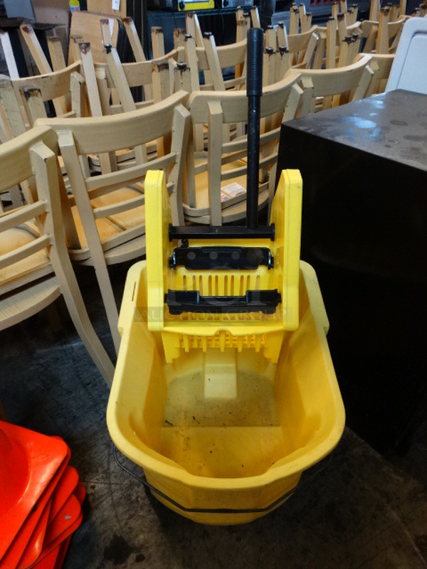Yellow Poly Mop Bucket w/ Wringing Attachment and Mop on Casters. 18x22x37