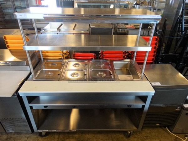 SWEET! 2014 Delfield Model EHE160C Stainless Steel Commercial 4 Well Steam Table w/ 2 Overshelves on Commercial Casters. 208/230 Volts, 1 Phase. 60x32x66