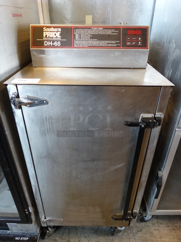 FANTASTIC! Southern Pride Model DH-65 Stainless Steel Commercial Electric Powered Single Door Smoker on Commercial Casters. 25x33x56