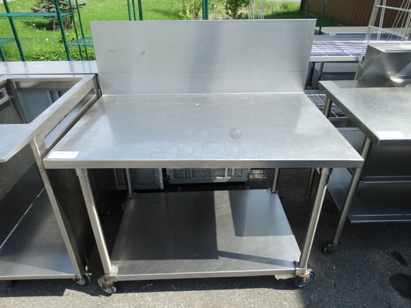 Stainless Steel Commercial Table w/ Undershelf and Backsplash on Commercial Casters. 48x30x51.5