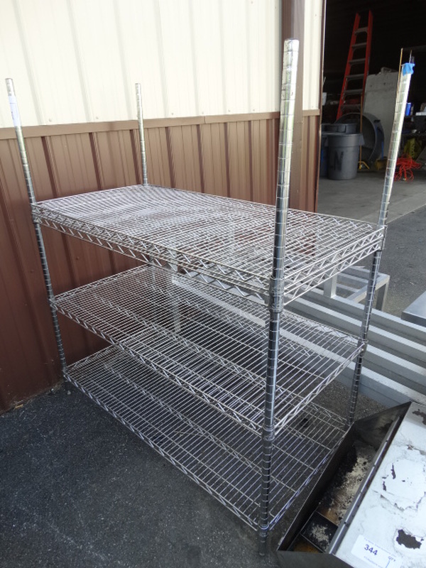 Chrome Finish 4 Tier Metro Shelving Unit. 48x24x55. BUYER MUST DISMANTLE. PCI CANNOT DISMANTLE FOR SHIPPING. PLEASE CONSIDER FREIGHT CHARGES. 
