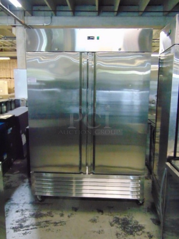 FABULOUS! SG Merchandising Model DD49-SDSS Commercial Stainless Steel Electric Double Door Freezer On Commercial Casters. 115 Volt 54.25x32.25x83 Tested And Working.