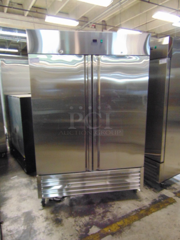 WOAH! BRAND NEW SG Merchandising Model DD49-SDSS Commercial Electric Double Door Freezer On Commercial Casters. 115 Volt 54x32x83 Tested And Working. 