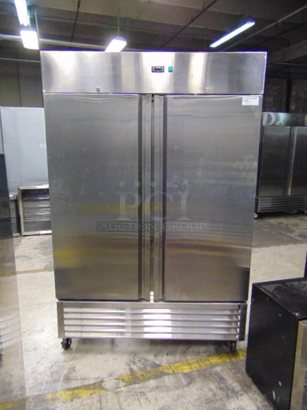 BEAUTIFUL! BRAND NEW SG Merchandising Model DD49-SDSS Commercial Stainless Steel Electric Double Door Freezer On Commercial Casters. 115 Volt 54x32x83 Tested And Working.