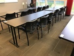 Two Black Laminated Wooden Desks w/ 6 Herman Miller Task Chairs