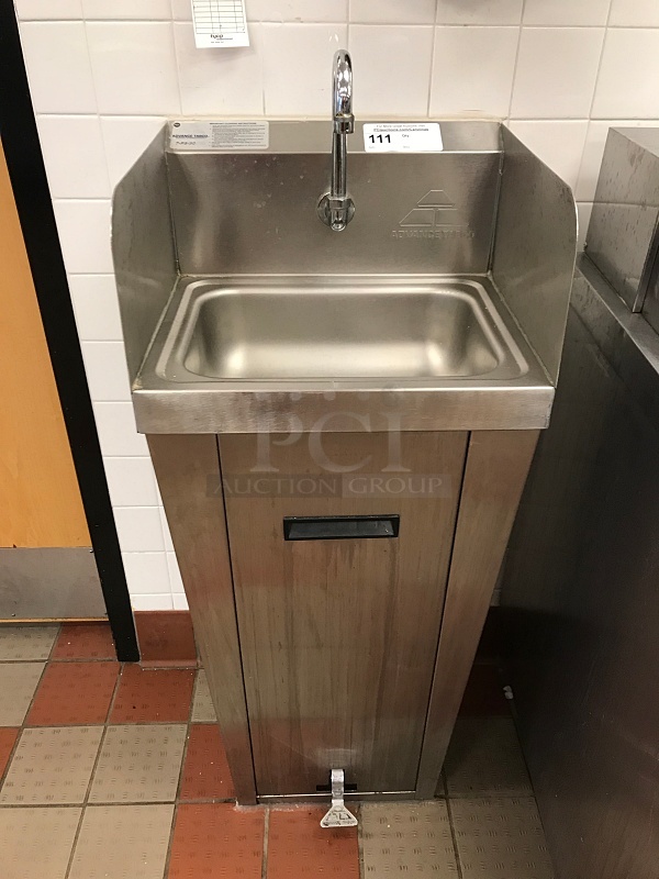 Advance Tabco Stainless Steel Pedestal Hand Sink w/ Foot Controls w/ Tork Pull Hand Towel Dispenser & Ecolab Automatic Hand Soap Dispenser  - Image 1 of 3