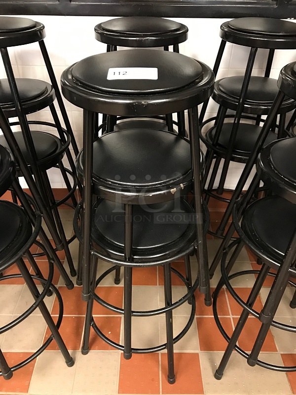 Six Stackable Black Metal Stools w/ Padded Seat 