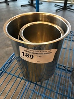 Four Stainless Steel Round Inserts