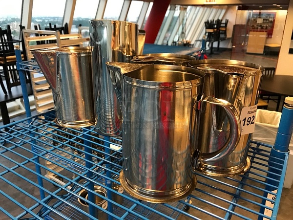 Five Stainless Steel Water Pitchers