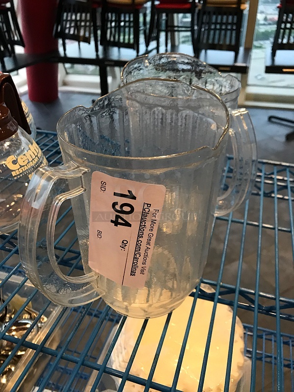 Two Plastic Water Pitchers