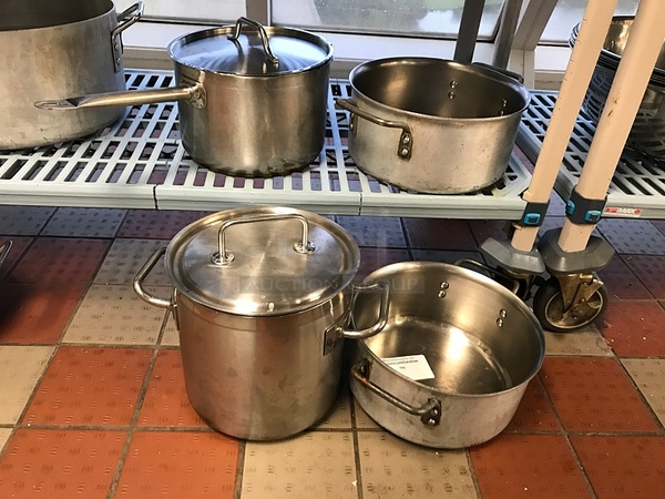 Four Assorted Stock Pots