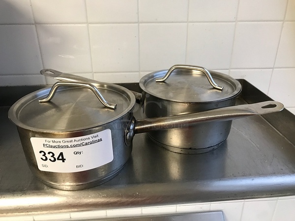 Two Stainless Steel Saucepans w/ Lids