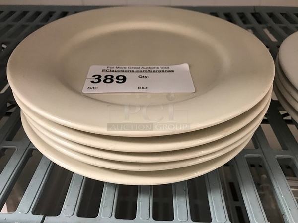 Five Porcelain Dinner Plates