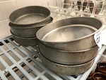 Seven Aluminum Cake Pans