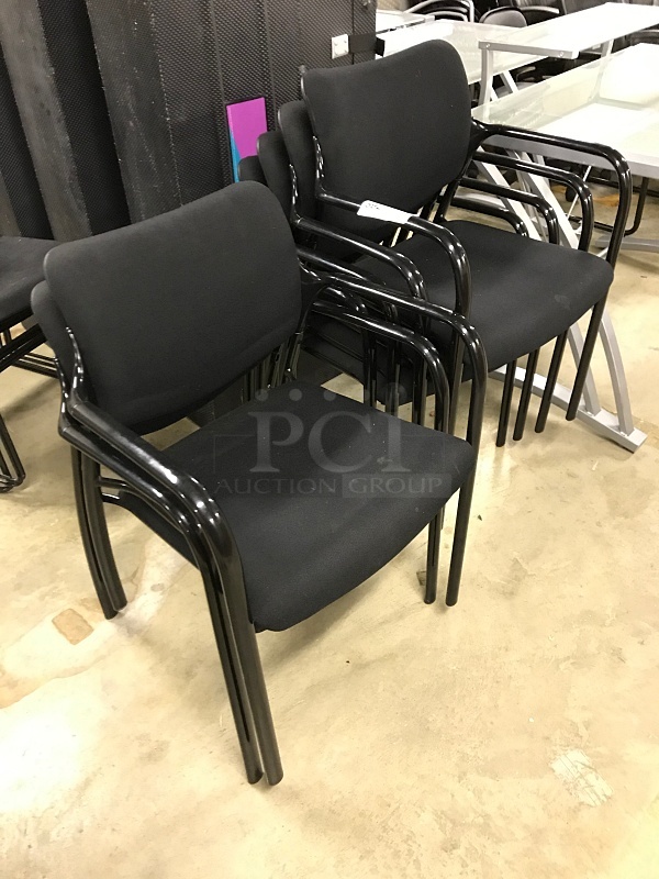 Six Black Stackable Herman Miller Chairs