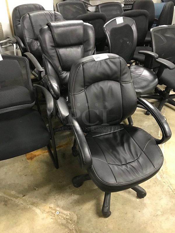 Four Assorted Padded Executive Chairs