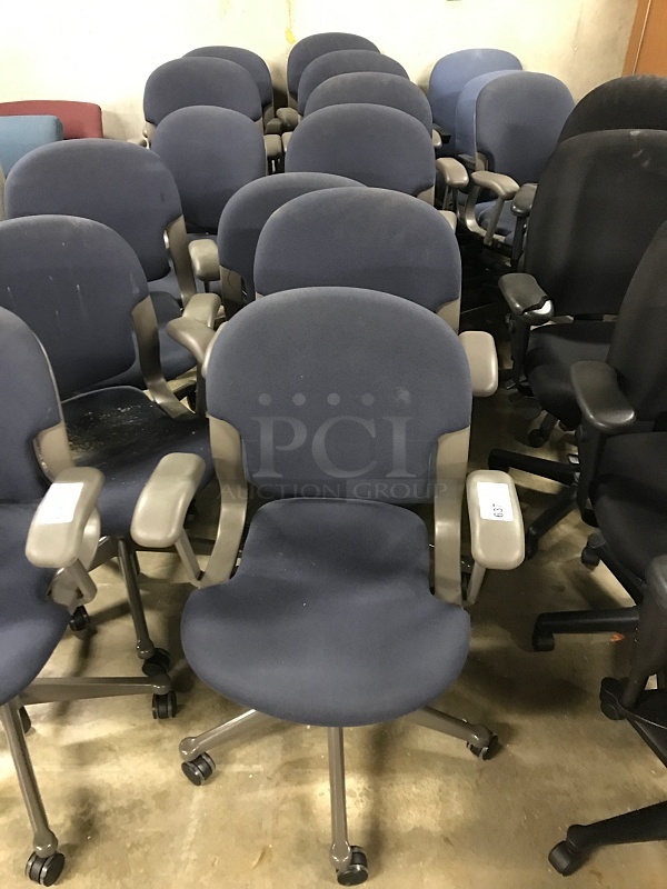 Seven Blue Cloth Task Chairs