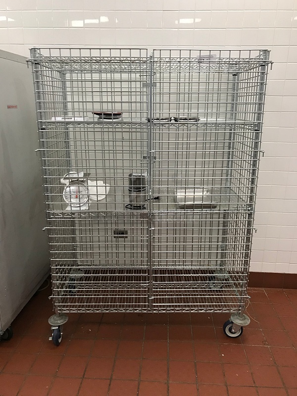 Lockable Cage Chrome Metro Rack w/ Four Shelves on Casters