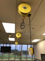 Three Ceiling Mounted Ericson 40' Power Reels Retractable Power Cord Extension Cord
