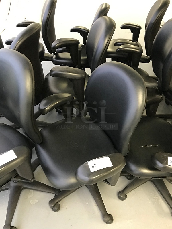 Three Herman Miller Vinyl Task Chairs w/ Arms