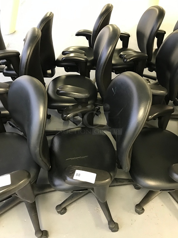 Three Herman Miller Vinyl Task Chairs w/ Arms