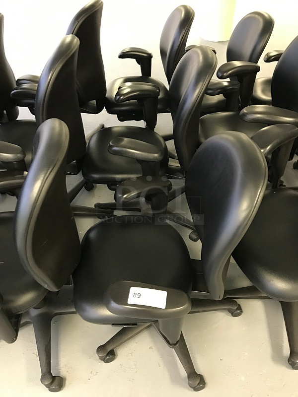 Three Herman Miller Vinyl Task Chairs w/ Arms