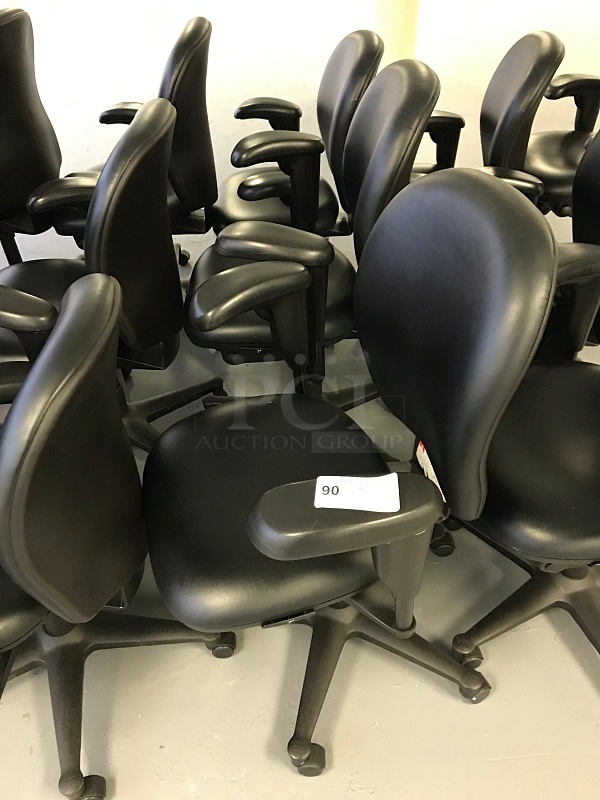 Three Herman Miller Vinyl Task Chairs w/ Arms