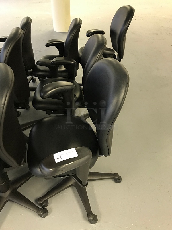 Four Herman Miller Vinyl Task Chairs w/ Arms