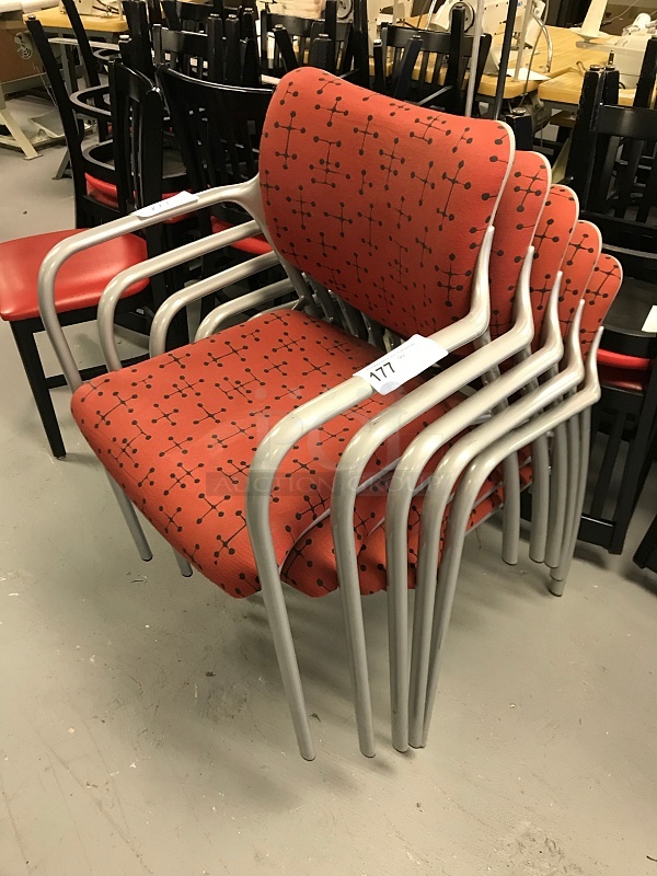 Five Red Herman Miller Stackable Chairs