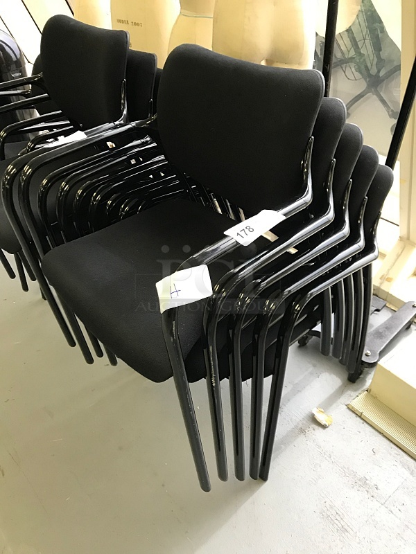 Five Black Stackable Herman Miller Chairs