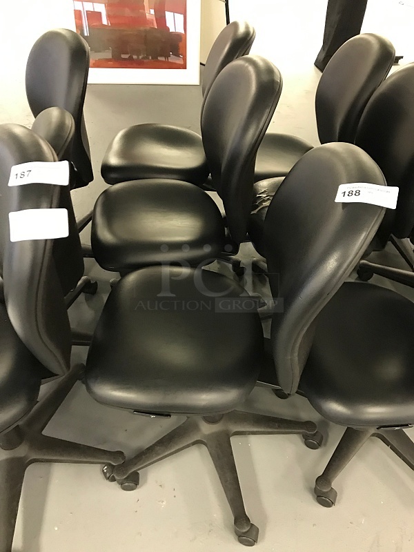Three Vinyl Padded Black Herman Miller task Chairs - Image 1 of 1