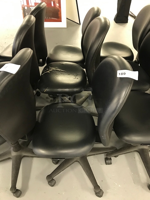 Three Vinyl Padded Black Herman Miller task Chairs