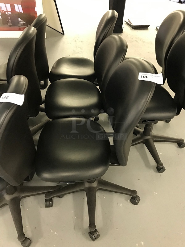 Five Vinyl Padded Black Herman Miller task Chairs