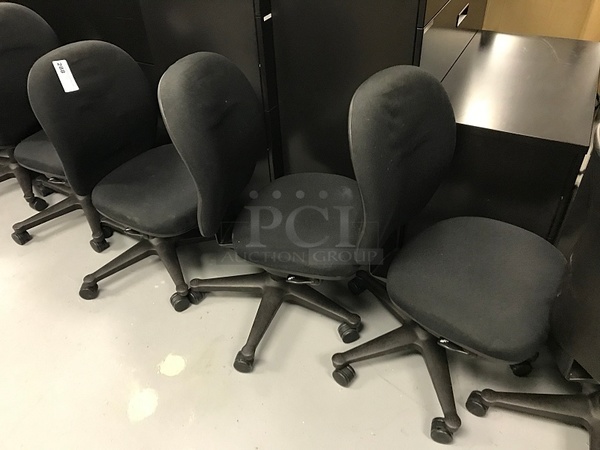 Seven Herman Miller Task Chairs