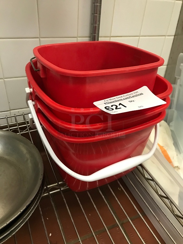 Four Red Sanitizer Buckets