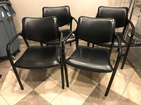 Four Herman Miller Black Vinyl Stackable Chairs