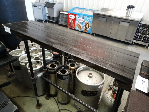 Wood Pattern Bar Height Table on 2 Metal Legs. Stock Picture - Cosmetic Condition May Vary. 48x14x48
 - Image 2 of 3