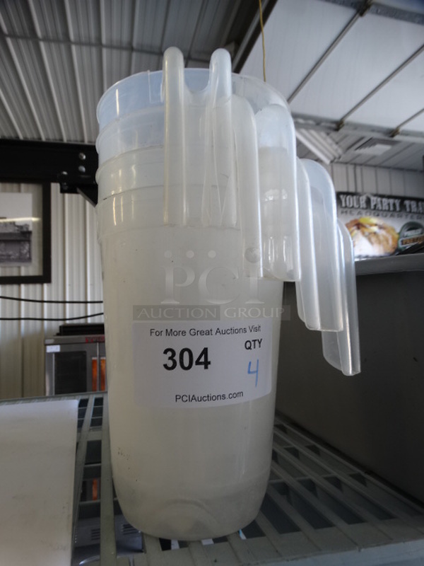 4 Poly Clear Pitchers. 8x5.5x8.5. 4 Times Your Bid!
 - Image 1 of 3