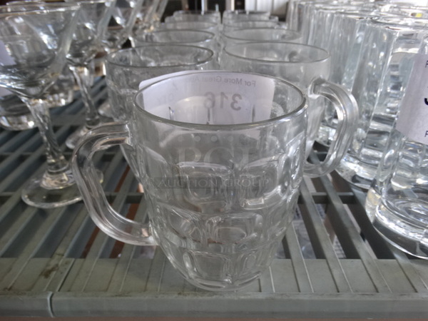 11 Glass Mugs. 5.5x4x5. 11 Times Your Bid!
 - Image 1 of 4