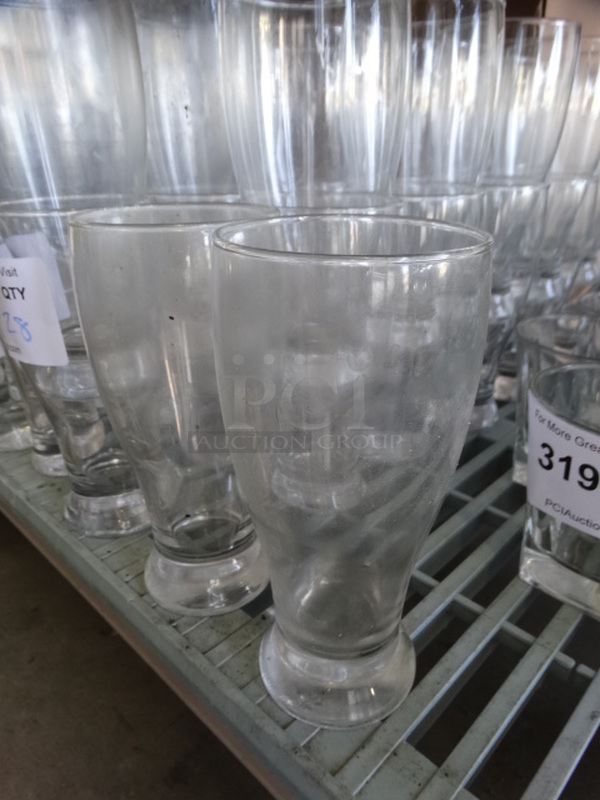 28 Beverage Glasses. 3.5x3.5x7. 28 Times Your Bid!
