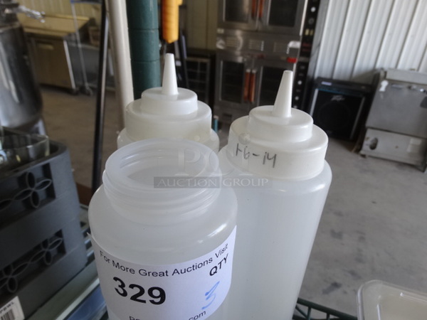 3 Poly Condiment Bottles. Missing 1 Lid. 3x3x12. 3 Times Your Bid!
 - Image 2 of 3