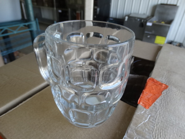 12 BRAND NEW IN BOX! Glass Mugs. 5.5x4x5. 12 Times Your Bid!
 - Image 3 of 4