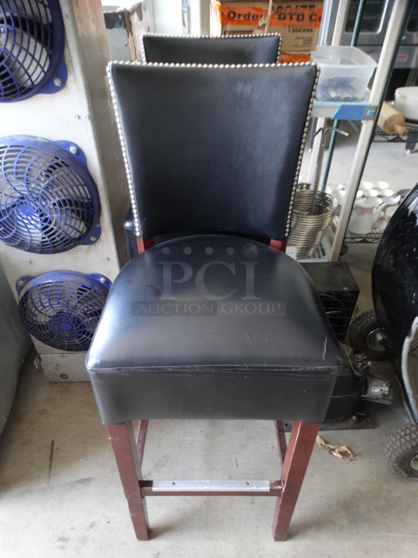 2 Black Pleather Bar Height Chairs on Wood Pattern Legs w/ Nail Head Trim. 18x18x44. 2 Times Your Bid! - Image 1 of 5