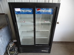 NICE! True Model GDM-33-SL-60PE5 Commercial 2 Door Reach In Cooler Merchandiser. 115 Volts, 1 Phase. 40x21x60. Tested and Powers On But Does Not Get Cold